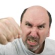 A middle age man yelling and hitting in an argument.  Anger Managment???
